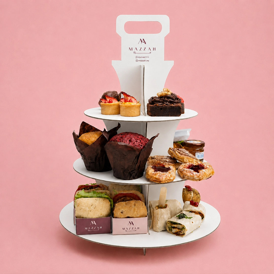 Mazzah Afternoon Box with assorted pastries and savoury bites, catering delivery in Abu Dhabi